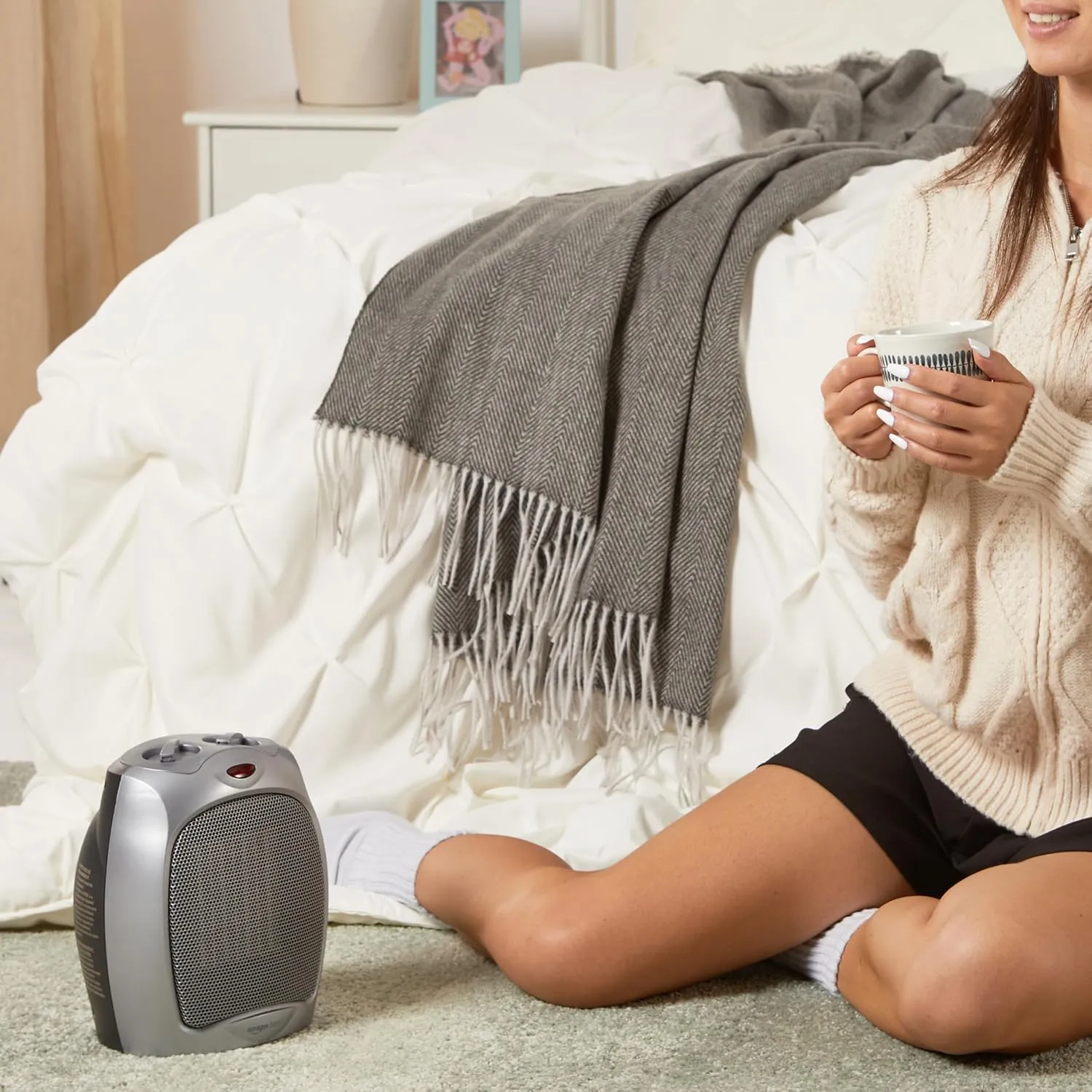Amazon Basics Ceramic Space Heater, Portable Indoor Heating Solution, With Overheat and Tip-Over Protection, Thermostat, Non-Oscillating, 1500W, 7.52"D x 6.34"W x 9.45"H, Silver